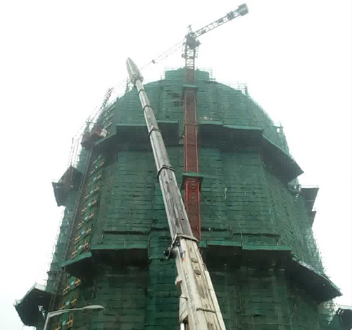 沙坪坝吊车在工地上作业